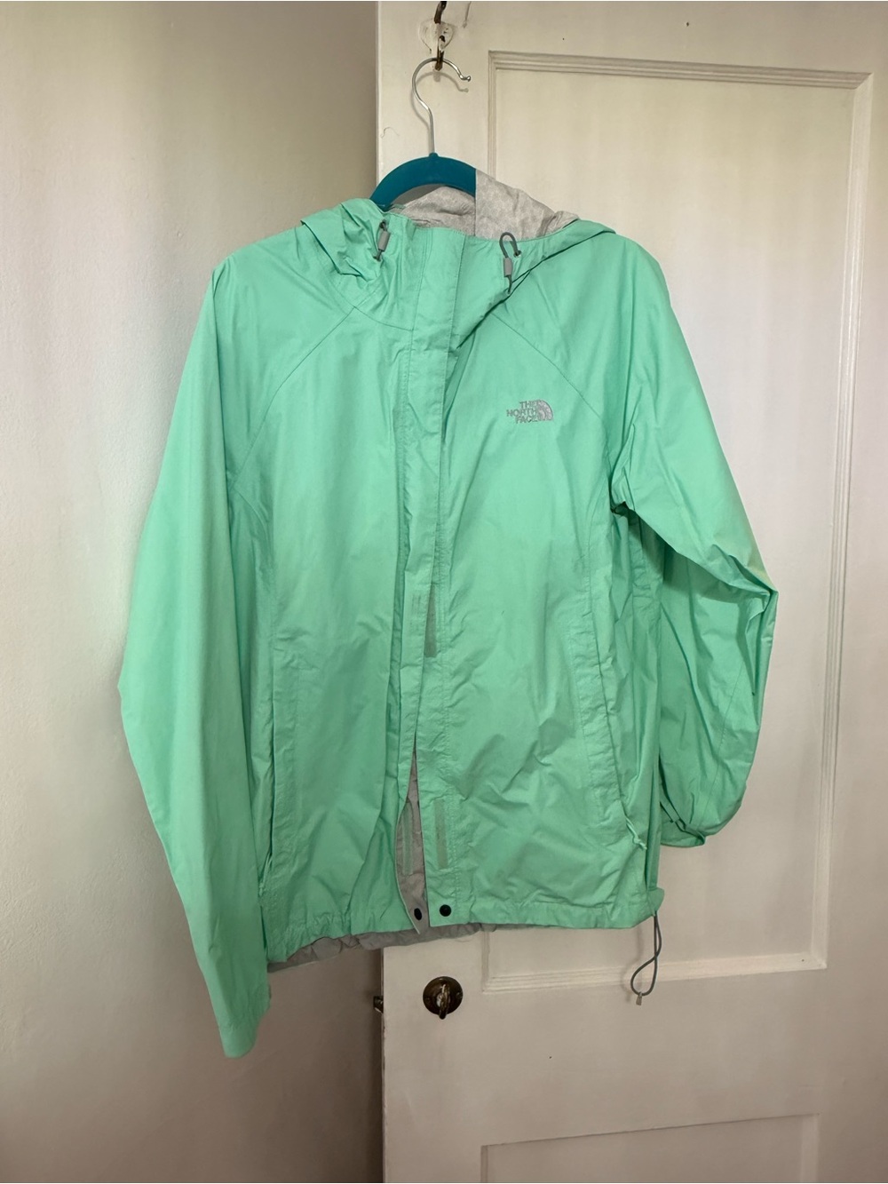 The North Face Mint Green Hooded Windbreaker Jacket